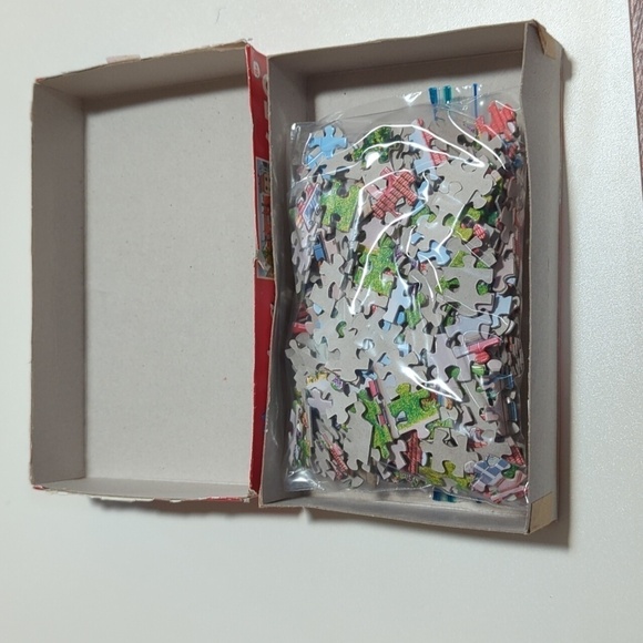 Puzzlebug 650 pc. Jigsaw Puzzle - Pretty Cafe Riga, Latvia Used - Picture 3 of 6